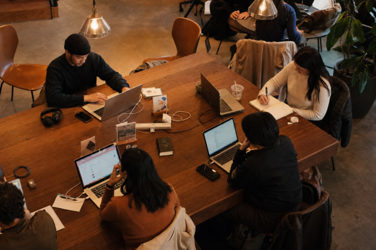 Is HotdeskOS worth it for a coworking space with 50+ desks trying to manage bookings without a receptionist?